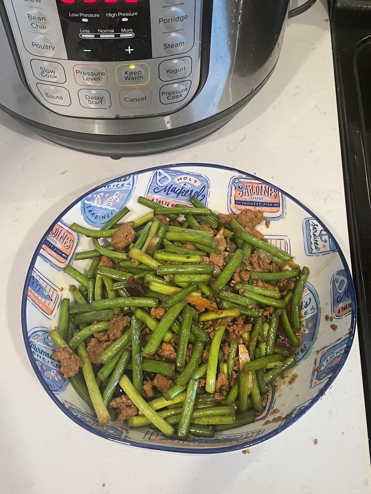 Stir-fried garlic scapes with minced pork